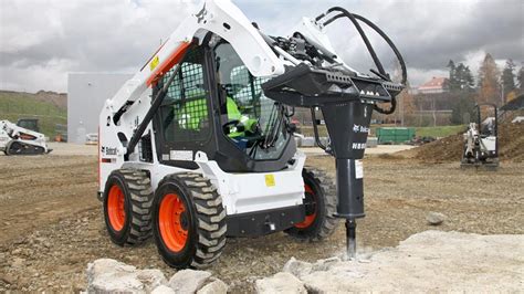 skid steer jack|cat skid steer hammer.